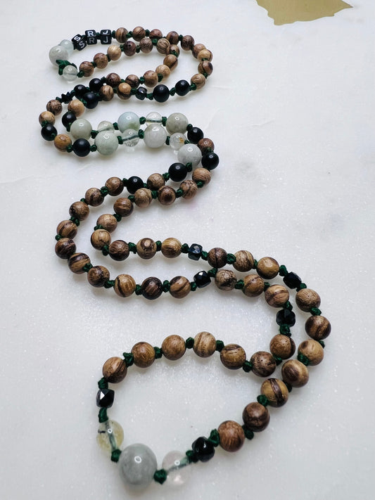 Burma Jade and Topaz Infinity necklace